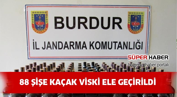 TİCARİ TAKSİDE 88 ŞİŞE KAÇAK VİSKİ ELE GEÇİRİLDİ