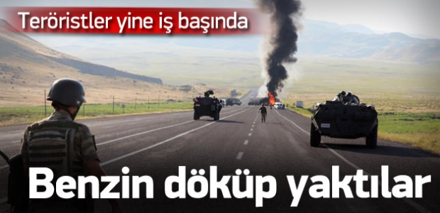 Teröristler yol kesip iş makinesi yaktı