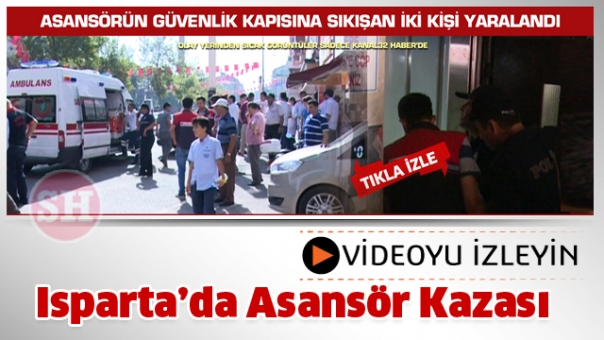 Asansörün güvenlik kapısına sıkışan iki kişi yaralandı